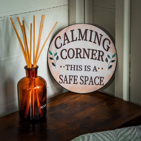 Reed diffuser and inspirational quote inside The Therapy Pod. Ellie's Talking Therapies' outdoor therapy pod near Bollington, Cheshire, an informal, open-air alternative to sitting face-to-face.